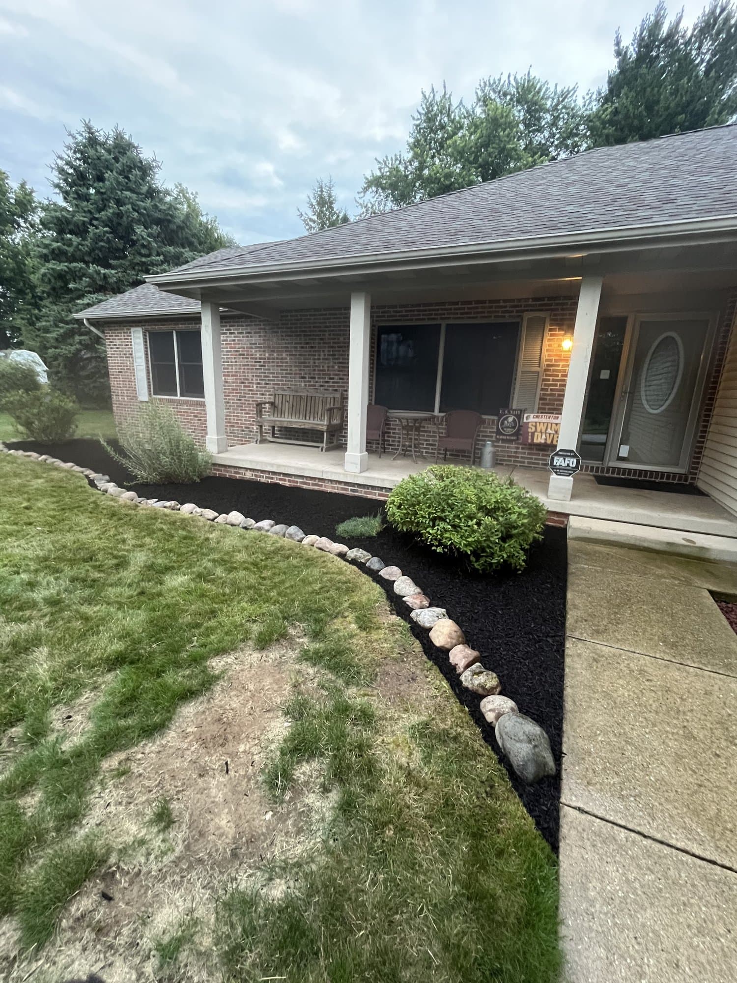 Front entrance mulch & stone border