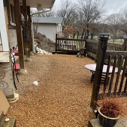 Backyard gravel patio installed by Meeks Mowing & Landscaping