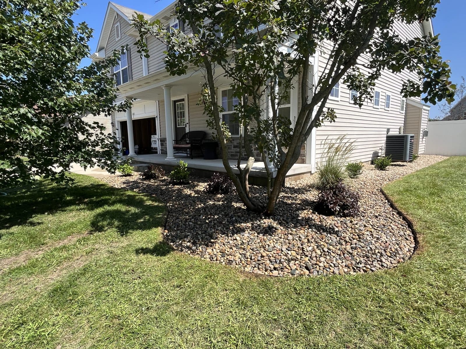 Crape myrtle bed with river-rock border