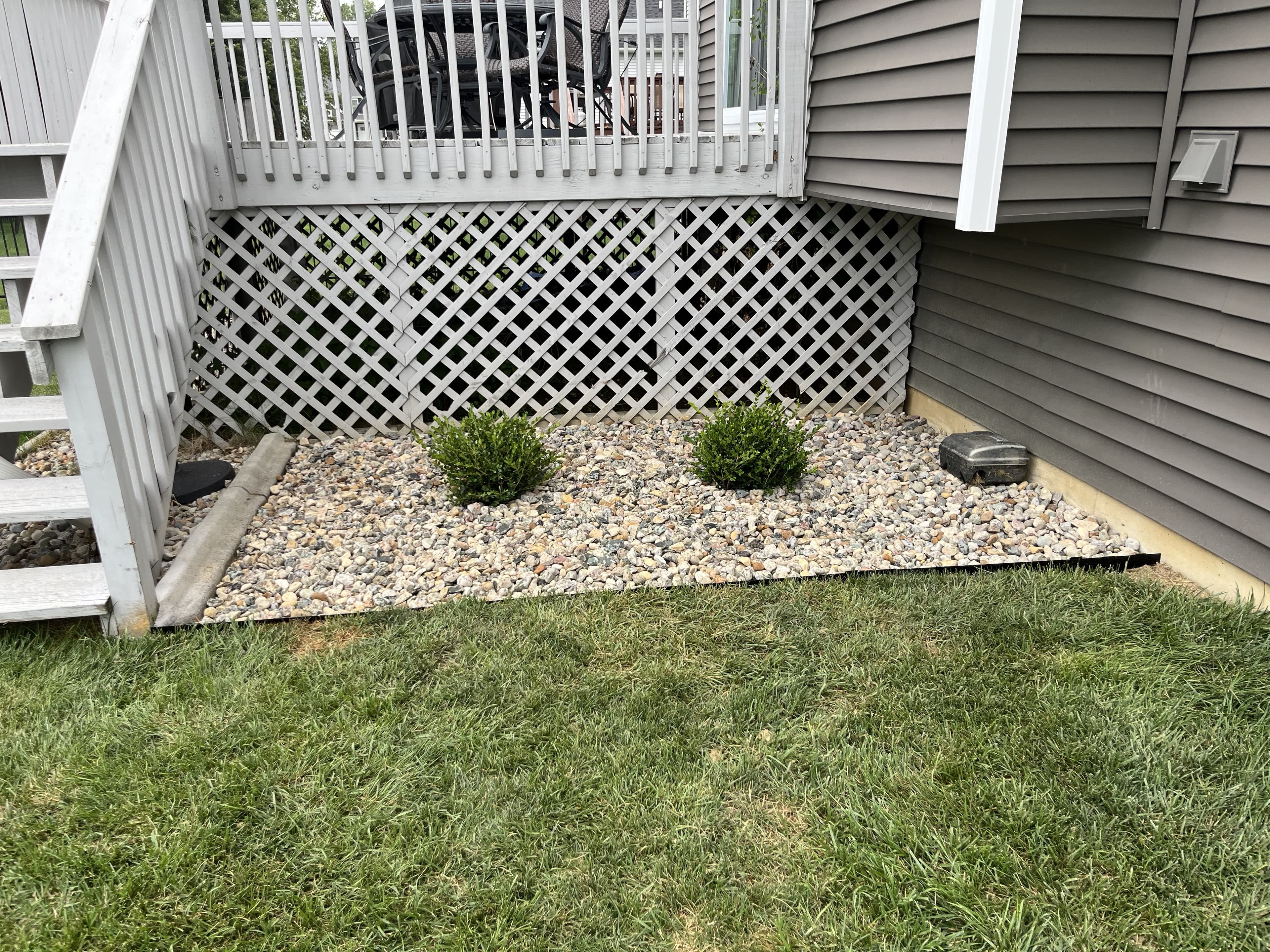 River-rock bed under deck